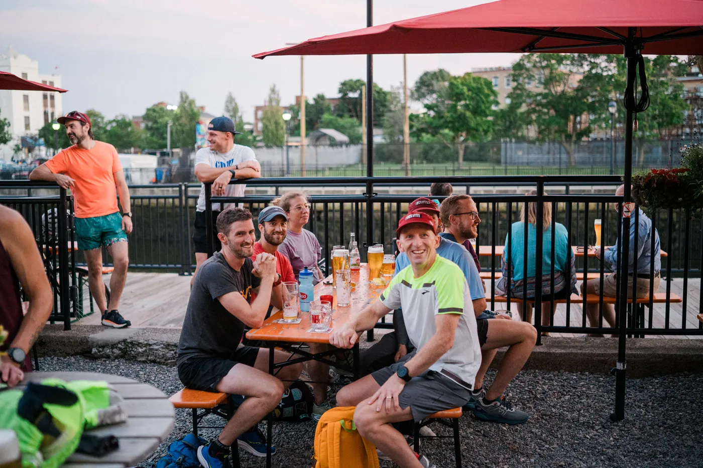 Meters for Liters runners at the taproom picnic tables after a social run